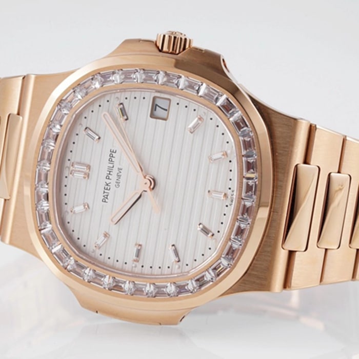 top-tier watch Patek Philippe men's white dialsteel bracelet watch front view