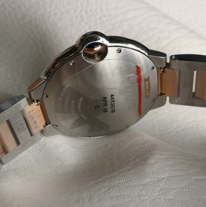 top-tier watch Cartier men's white dial blue balloon series steel bracelet watch side view