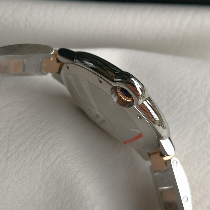 top-tier watch Cartier men's white dial blue balloon series steel bracelet watch side view