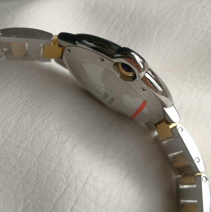 top-tier watch Cartier men's white dial blue balloon series steel bracelet watch side view