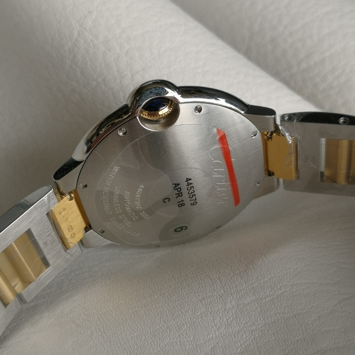 top-tier watch Cartier men's white dial blue balloon series steel bracelet watch side view
