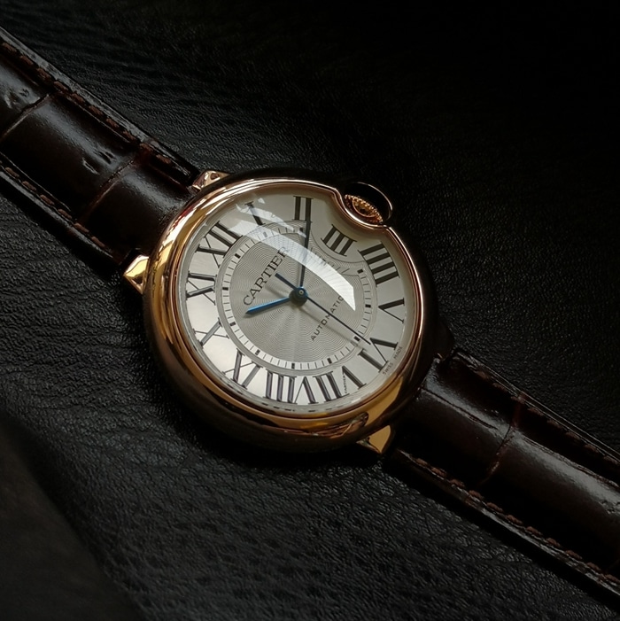 top-tier watch Cartier men's white dial blue balloon series c series leather strap watch front view