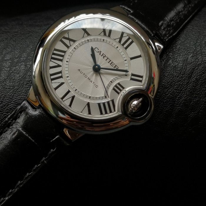 top-tier watch Cartier men's white dial blue balloon series leather strap watch front view
