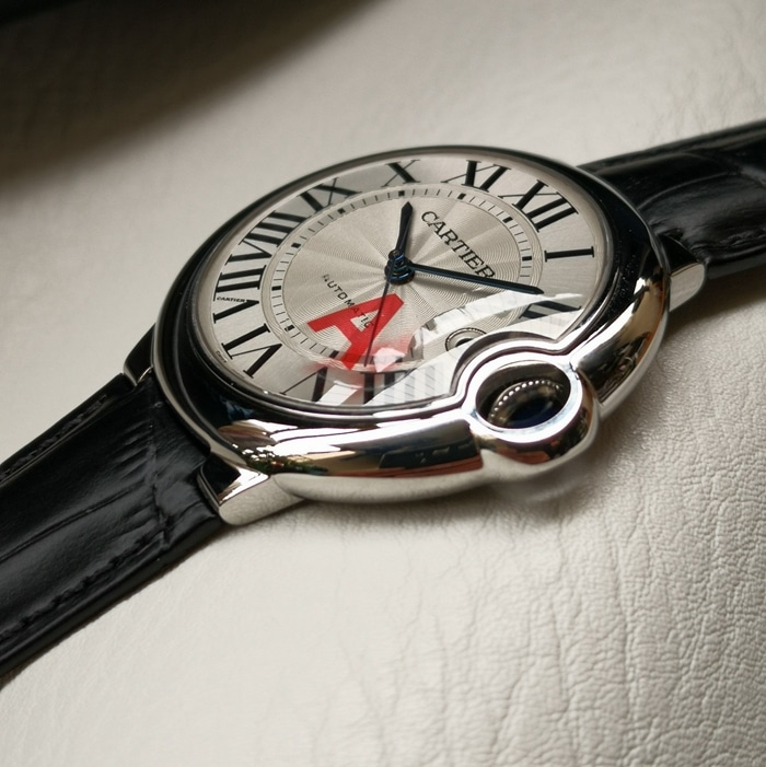 top-tier watch Cartier men's white dial blue balloon series leather strap watch side view