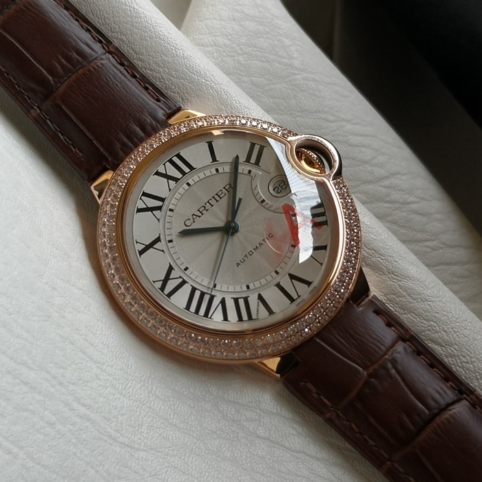 top-tier watch Cartier men's white dial blue balloon leather strap watch front view