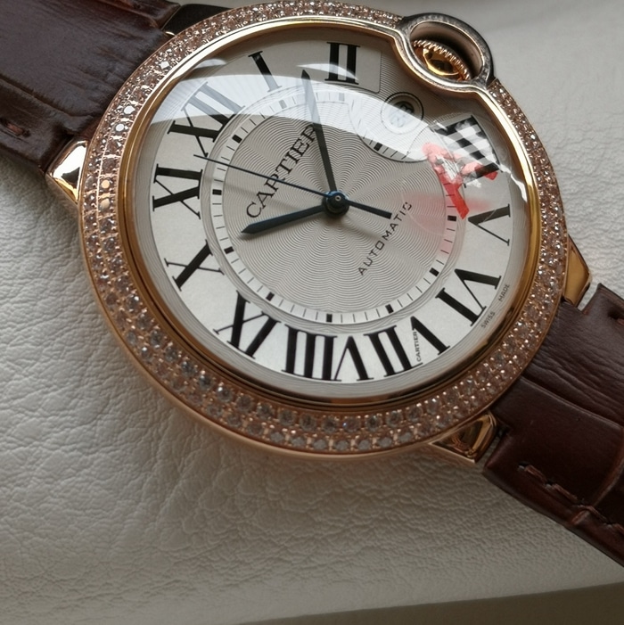 top-tier watch Cartier men's white dial blue balloon leather strap watch front view
