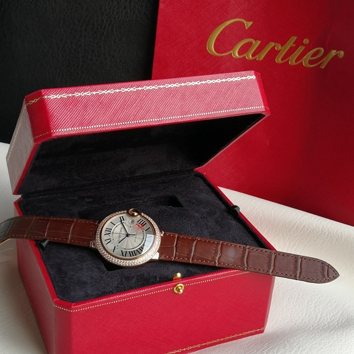top-tier watch Cartier men's white dial blue balloon leather strap watch front view