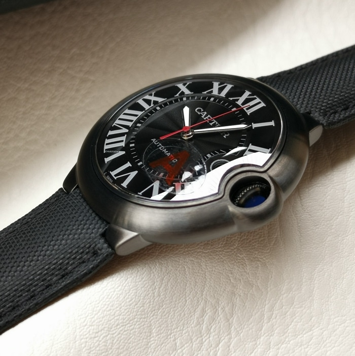 top-tier watch Cartier men's black dial blue balloon mechanical leather strap watch side view