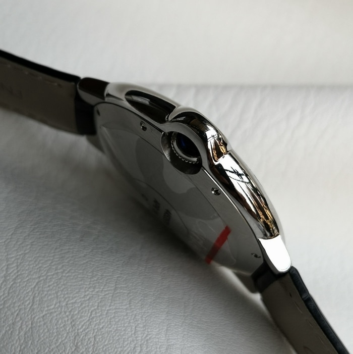 top-tier watch Cartier men's black dial blue balloon series mechanical leather strap watch side view