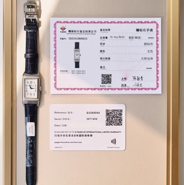 Top Jaeger-LeCoultre women's watch, white dial Reverso series, leather strap, front view