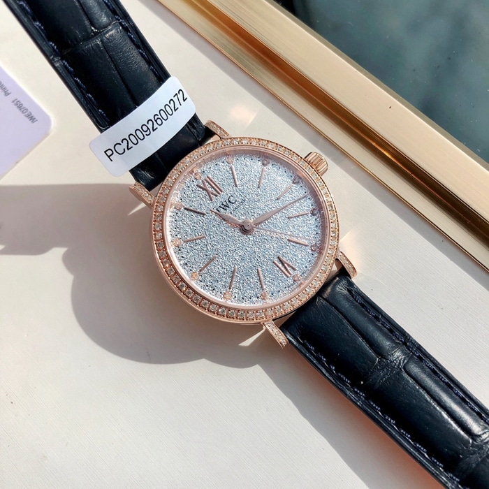 top-tier watch IWC women's white dial Portofino mechanical leather strap watch front view