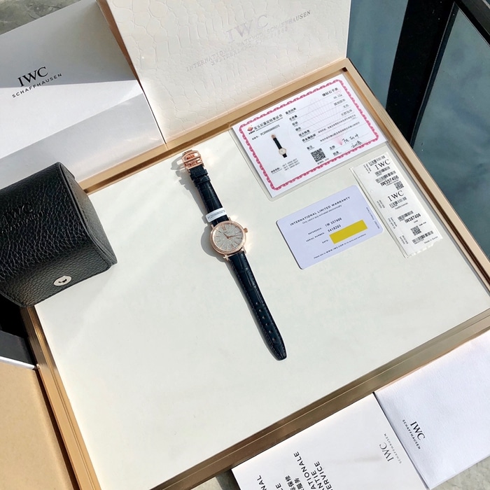 top-tier watch IWC women's white dial Portofino mechanical leather strap watch front view