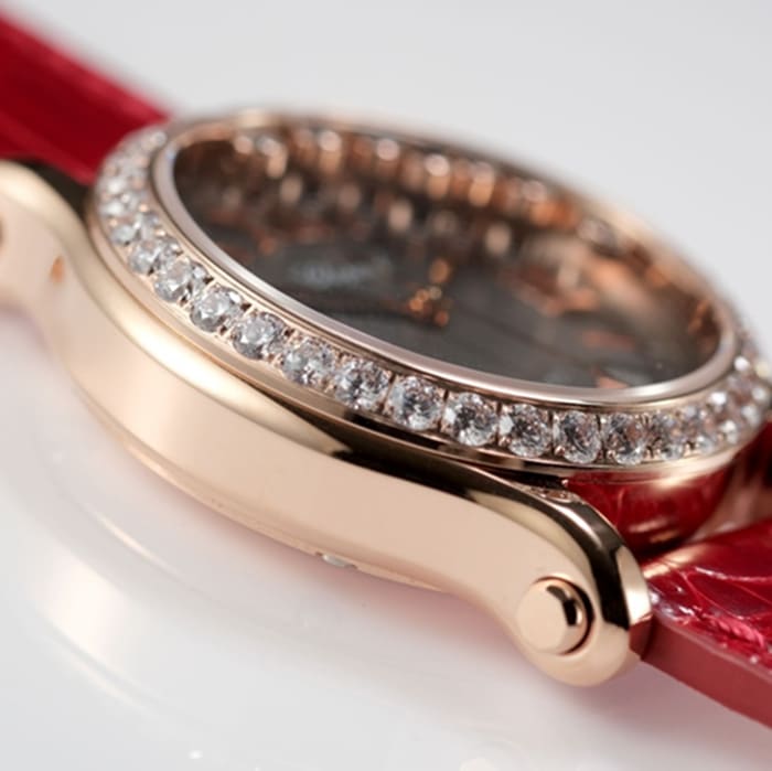 top-tier watch Chopard women's black dial red band happy diamond HAPPY DIAMONDS series mechanical watch side view