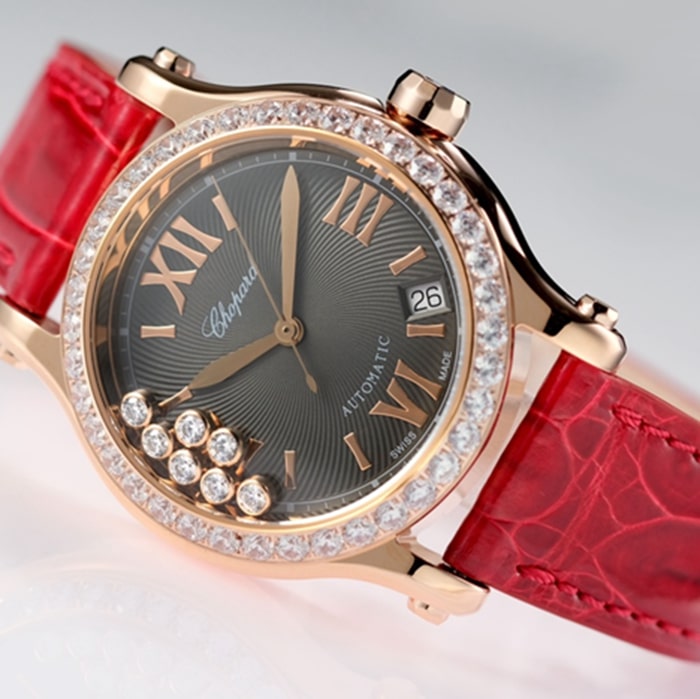top-tier watch Chopard women's black dial red band happy diamond HAPPY DIAMONDS series mechanical watch front view