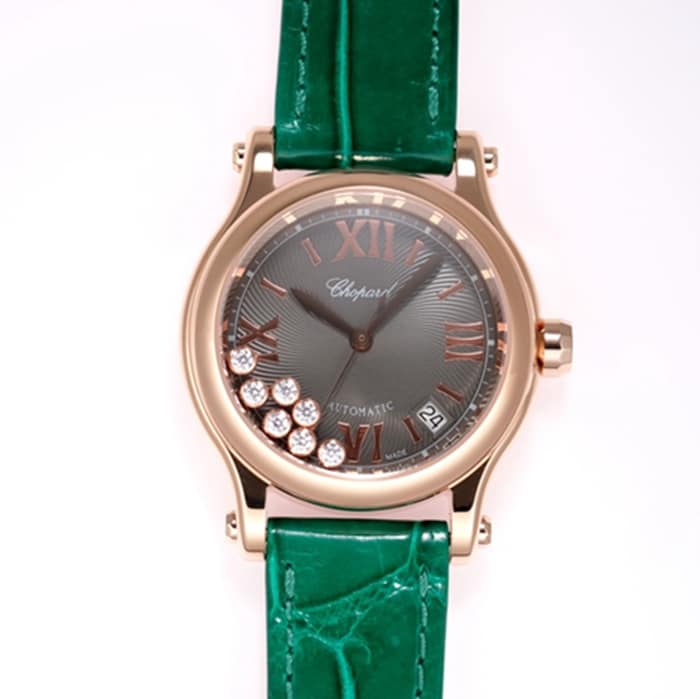 Top Chopard women's watch, black dial, green strap, HAPPY DIAMONDS series, mechanical leather strap, front view.