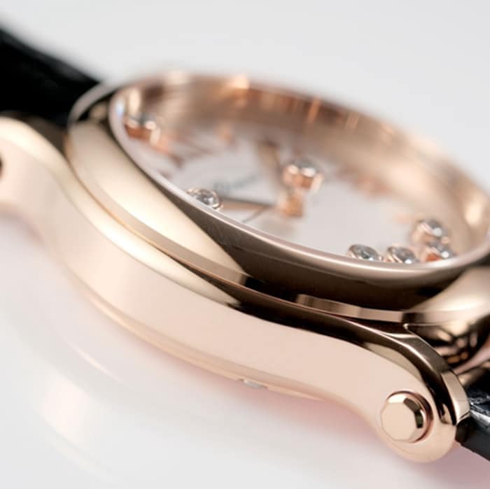 Top collectible watches Chopard Women's White Plate Black Strap Happy Diamonds Collection Side View