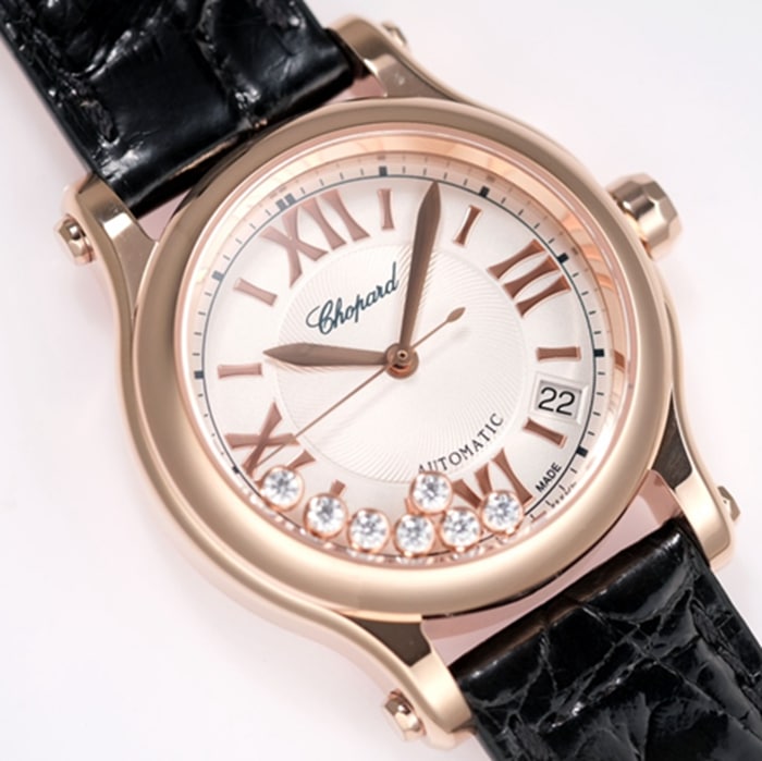 Top collectible watches Chopard Women's White Plate Black Strap Happy Diamonds Collection Front View