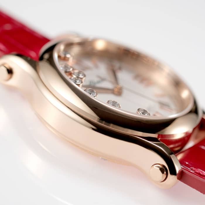 Top-tier watch Chopard women's white dial red band happy diamond series leather strap watch side view