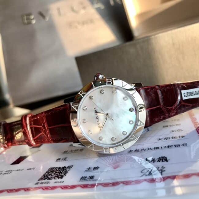 top-tier watch Bvlgari women's white dial green strap elegant fashion leather strap watch front view