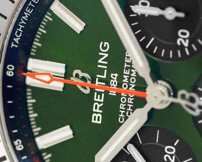 top-tier watch Breitling men's green dial steel automatic movement watch detail shots