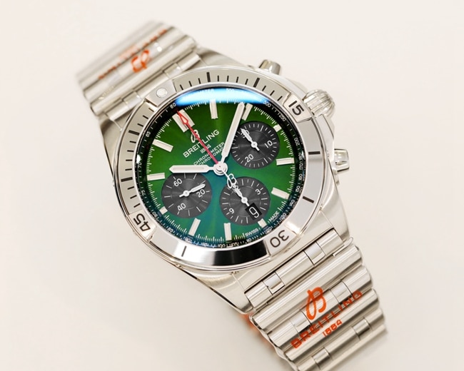 top-tier watch Breitling men's green dial steel automatic movement watch front view