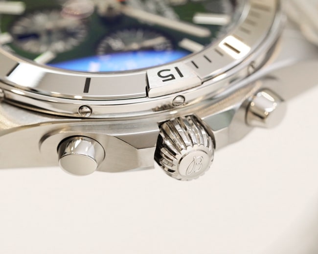 top-tier watch Breitling men's green dial steel automatic movement watch detail shots