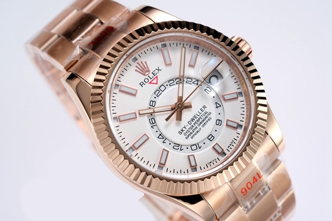 Top Rolex men's watch, white dial, rose gold, with the Explorer II series mechanical watch, front view.