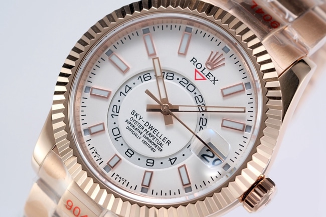 Top Rolex men's watch, white dial, rose gold, with the Explorer II series mechanical watch, front view.