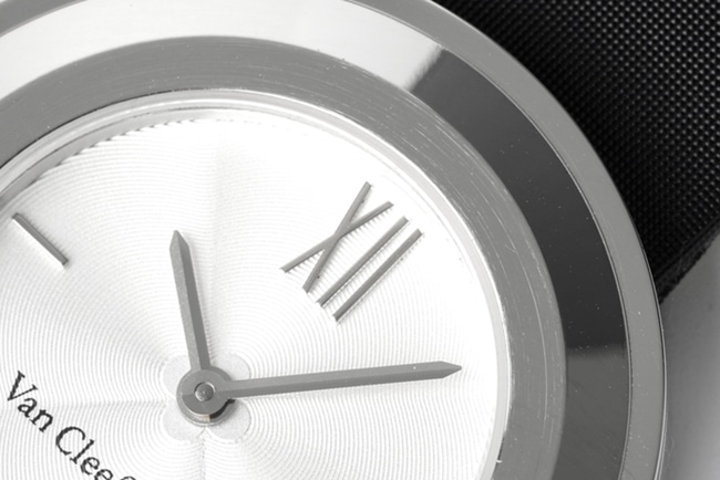 top-tier Van Cleef & Arpels women's white dial black belt quartzleather strap watch detail shots