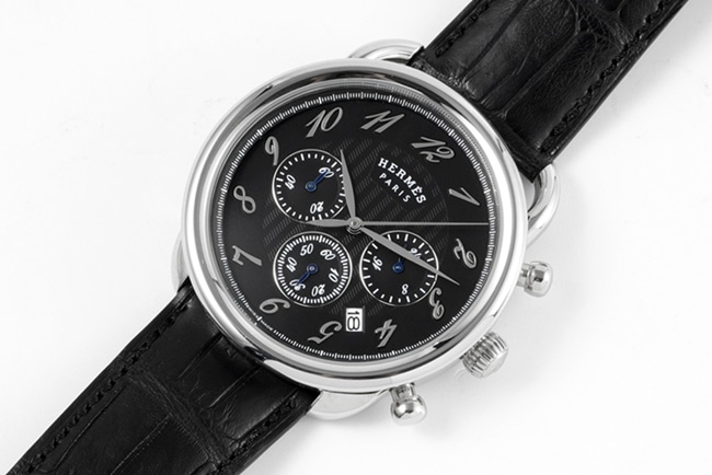 top-tier Hermès men's black dial black belt quartzleather strap watch front view