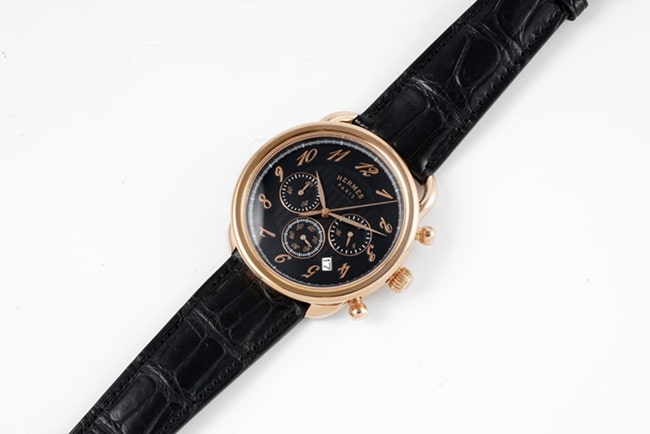 top-tier Hermès men's black dial black belt retro sentiment quartzleather strap watch front view
