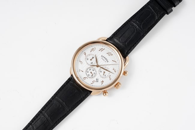 top-tier Hermès men's white dial black belt quartzleather strap watch front view