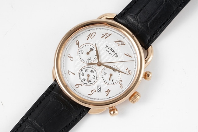 top-tier Hermès men's white dial black belt quartzleather strap watch front view