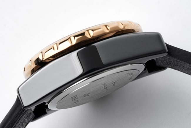 top-tier replicaChanel women's black dial black belt J12 series quartzleather strap watch side view