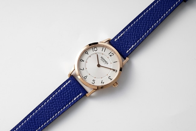 top-tier Hermès women's white dial blue band quartzleather strap watch front view
