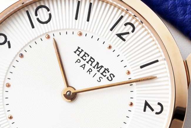 top-tier Hermès women's white dial blue belt quartzleather strap watch detail shots