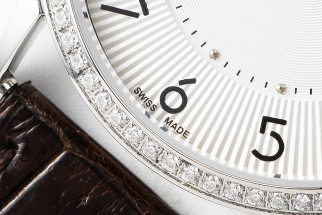 top-tier Hermès women's white dial black belt quartzleather strap watch detail shots