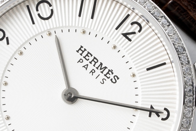 top-tier Hermès women's white dial black belt quartzleather strap watch detail shots