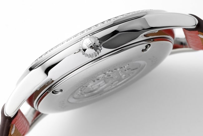 top-tier Hermès Slim d’Hermes women’s white dial red band quartz watch side view