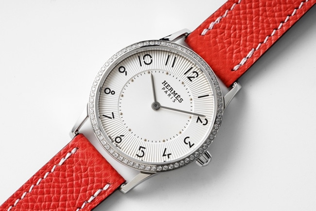 top-tier Hermès Slim d’Hermes women’s white dial red band quartz watch front view