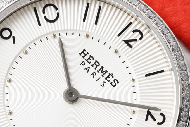 top-tier Hermes Slim d’Hermes women’s white dial red band quartz watch detail shots