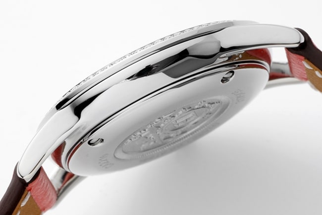 top-tier Hermès Slim d’Hermes women’s white dial red band quartz watch side view