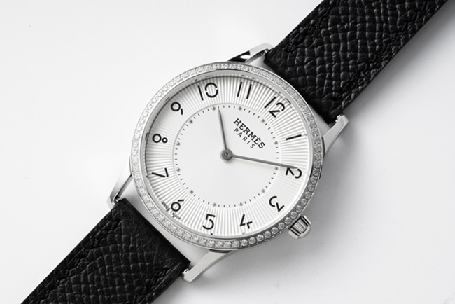 top-tier Hermès women's white dial black belt quartz watch front view
