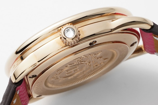 top-tier Hermès women's white dial red strap classic series quartzleather strap watch side view
