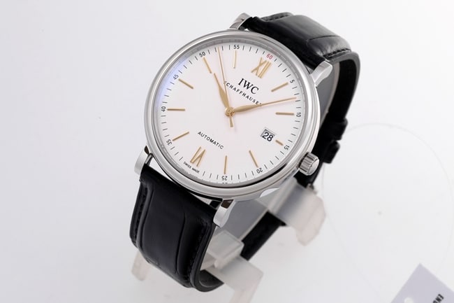 V7 factory IWC top-tier replicahigh-quality watch men's white dial black belt wave Fino series disc automatic movementleather strap watch front view