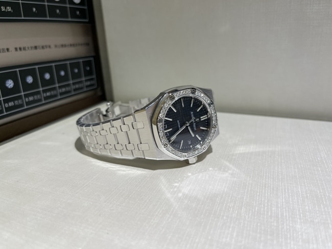 Top Audemars Piguet watches for men black plate steel mechanical watch front view