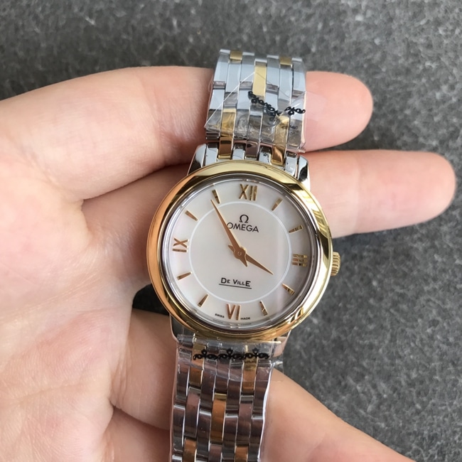 DK factory top-tier replicaOmegasuper watch women's white dial gold steel bracelet new quartz Diefei series watch front view