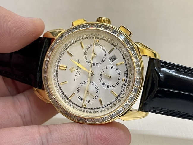 top-tier watch Patek Philippe women's white dial black belt complex chronograph function series leather strap watch front view