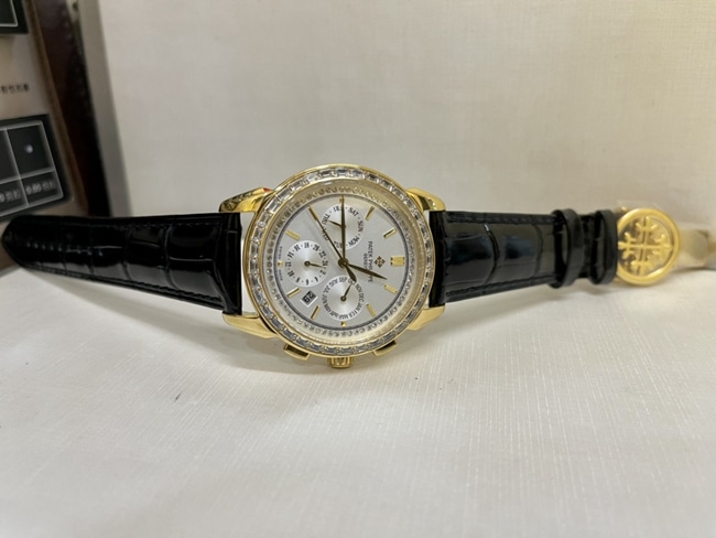 top-tier watch Patek Philippe women's white dial black belt complex chronograph function series leather strap watch front view