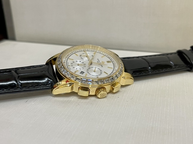 top-tier watch Patek Philippe women's white dial black belt complex chronograph function series leather strap watch side view